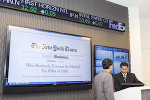 presenter next to projection screen